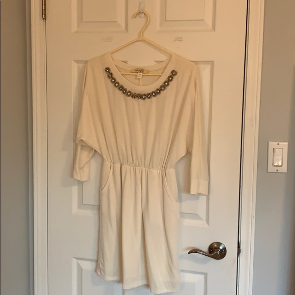 Cream colored soft 3/4 length sleeve dress
